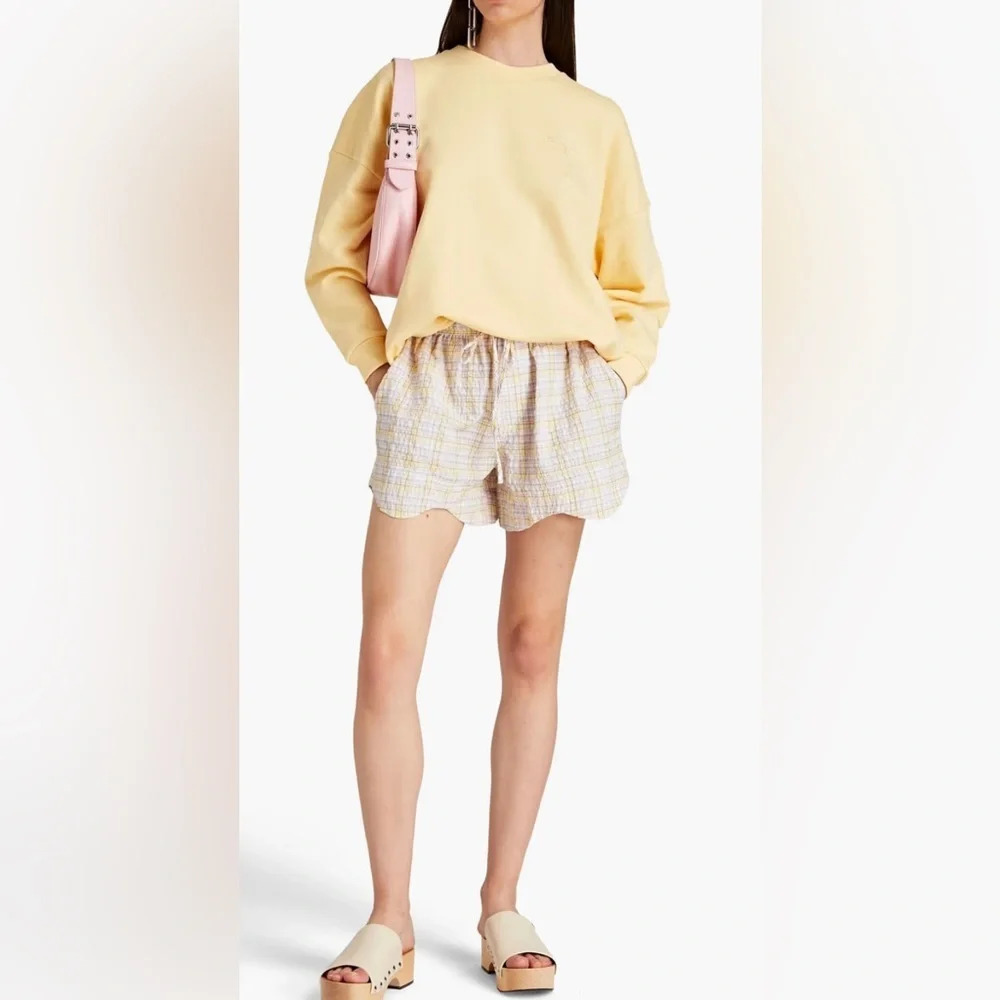 ! GANNI
Checked cotton-blend seersucker shorts